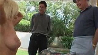 A sexy milf is getting fucked in front of two guys - porn video