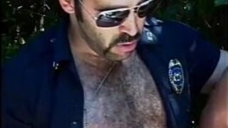 Hot cub police officer gets blowjob outside - porn video