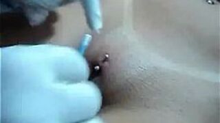 PUTTING PIERCING IN THE PUSSY - porn video